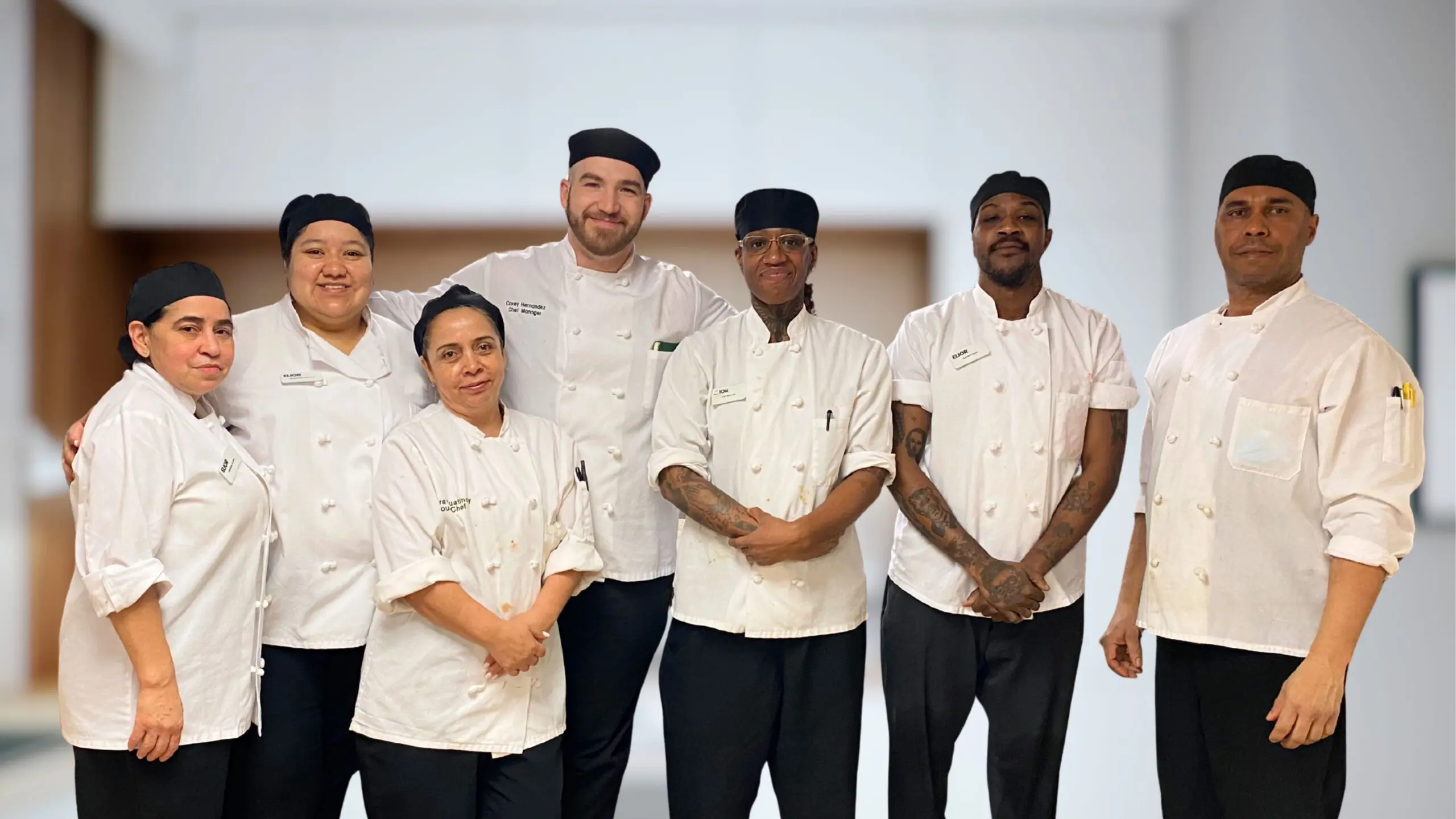 Staff smiling in chef coats